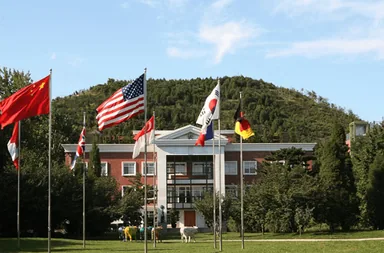 Beijing Huijia Private School campus entrance and flags