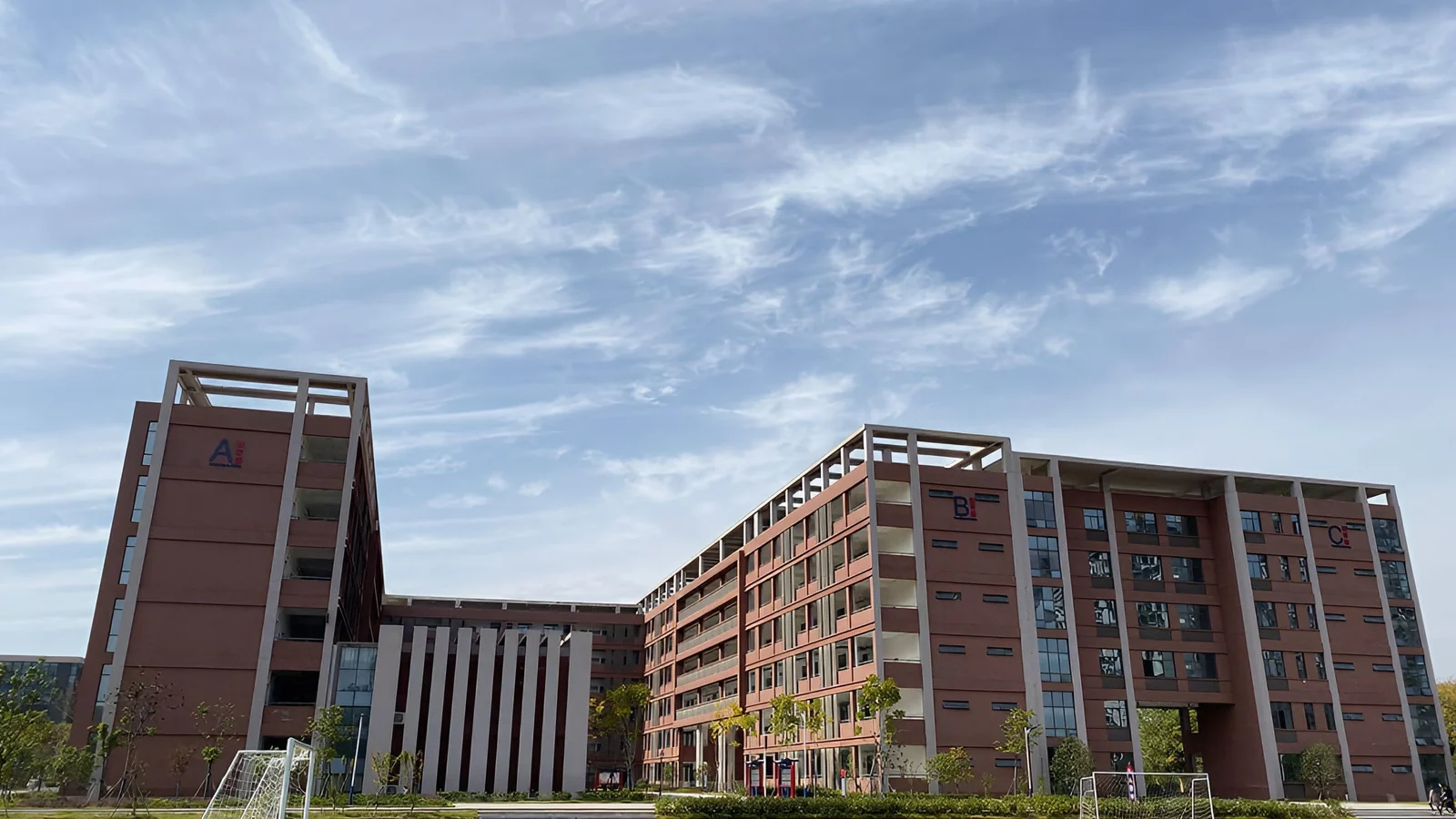 Hefei Thomas School campus buildings and sports field