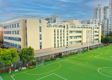Yew Chung International School campus building and sports field